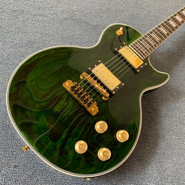 

electric guitar, rosewood fingerboard, gold hardware, mahogany body