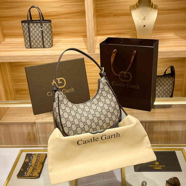 

women's autumn and winter new old flower armpit versatile one shoulder magic stick women's hand tide bag