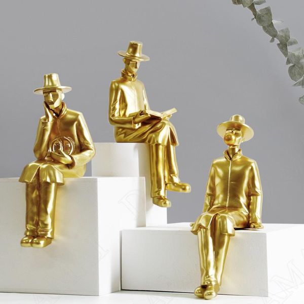 Dekorative Objekte, Figuren, europäisches Kunstharz, Kreativität, kleiner goldener Mann, Bücherregal, Statue, Büro, Schreibtisch, Ornamente, Kunst, Heimdekoration