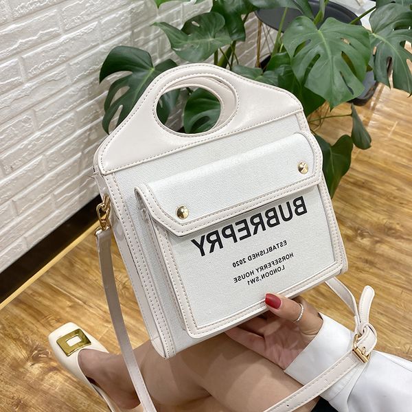 

designer bags 2022 new fashion messenger bag trend portable women's ins canvas splicing contrast single shoulder personalized