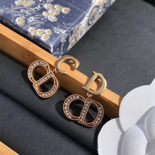 

80% off online store 20-year-old new letter inlaid diamond earrings net red high version anti allergy silver needle earrings female, Golden