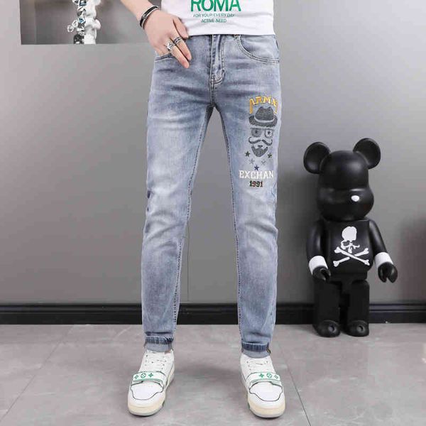 

blue jeans men's spring and summer new high-end korean embroidery elastic slim fit small feet casual handsome pants