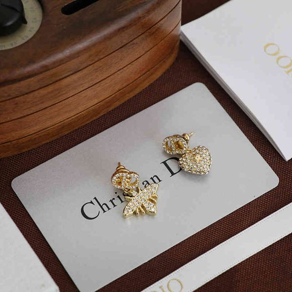 

2022 factory wholesale new asymmetric female diamond dijia net red love earrings, Golden