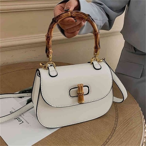 

super low spring fashion lovely one shoulder portable fresh and sweet shell foreign style bag 75% purses stores sale