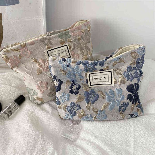 

cosmetic bags female handbag design embossed flowers makeup bags women casual portable zipper mini square cosmetic bag 220409