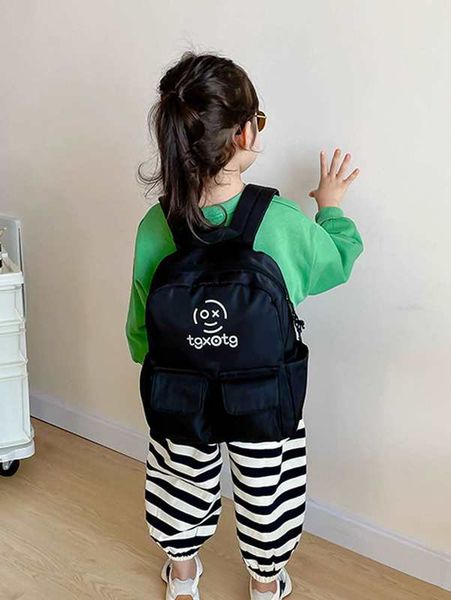 

kids multi-compartment letter graphic backpack she