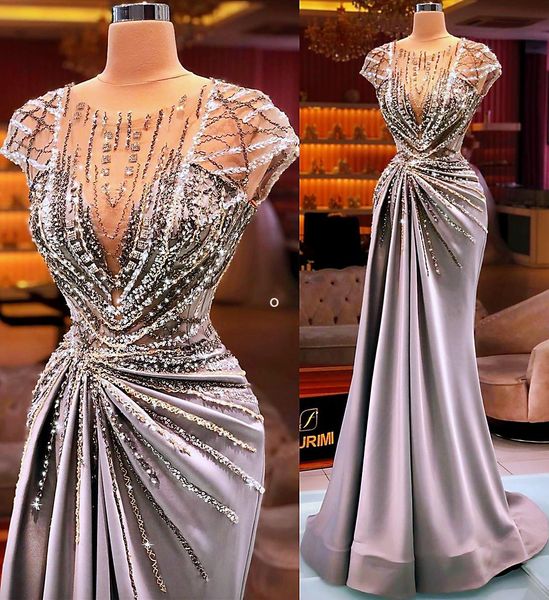 2022 Plus Size Arabo Aso Ebi Silver Mermaid Abiti da ballo di lusso Sheer Neck Cristalli di perline Sera formale Party Second Reception Gowns Dress