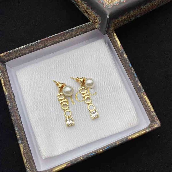 

2022 factory wholesale new di home simple hundred tower letters pearl net red same earrings, Golden