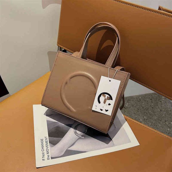 

factory direct sale niche dign premium women's 2022 new style small square hand simple tote single shoulder msenger bag designer