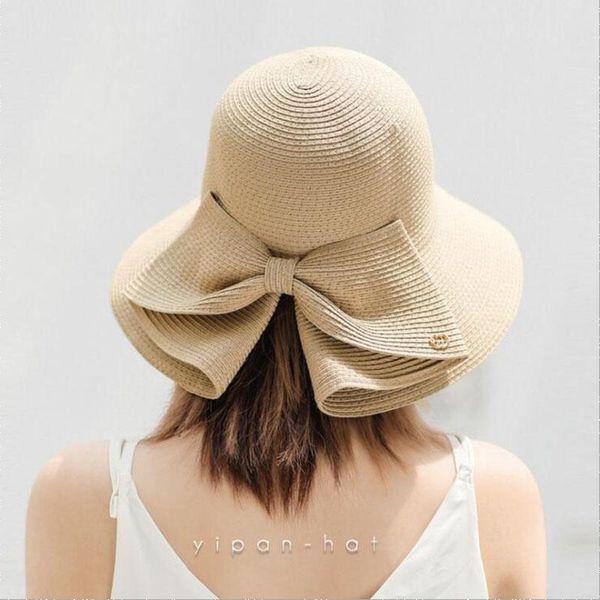 Berretti Lady Bowknot Cappello di paglia Protezione solare per adulti Estate Berretto per il tempo libero Studenti a tesa larga Rafia fresca Ombreggiatura Sole Pieghevole Berretti