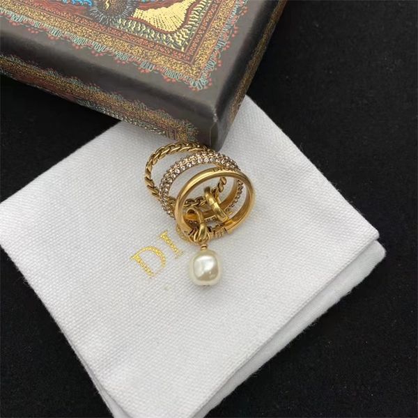 

10% off jewelry the new autumn and new fashion pearl female diamond set twisted three letter ring, Silver