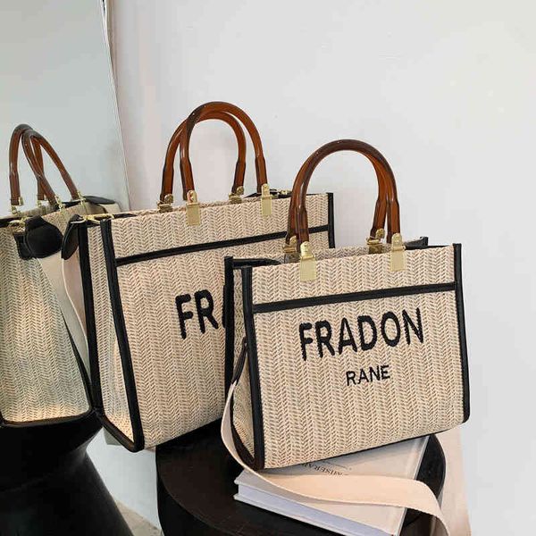 

2022 new same big women's large capacity tote bag letter straw one shoulder slant span bag