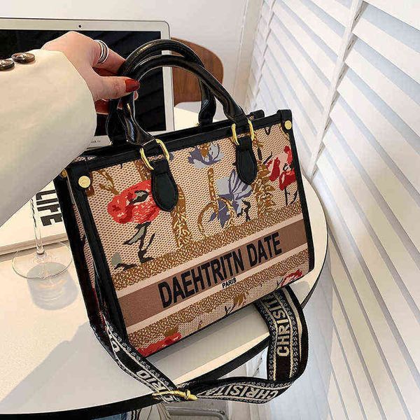

factory outle 70% off capacity tote 2022 tide new graffiti fashion commuter single shoulder messenger bag