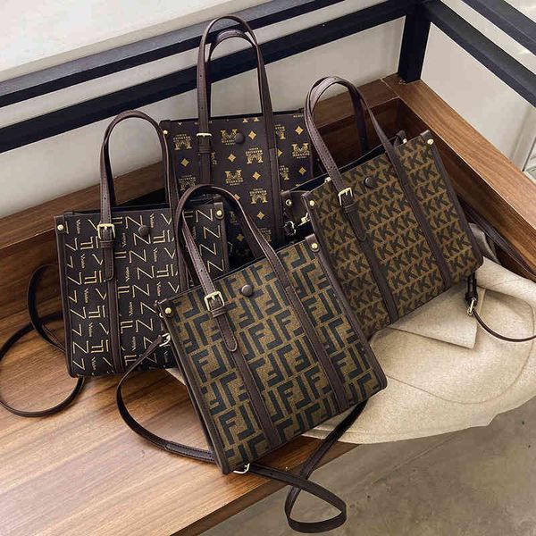 

2022 new designer handbags printed high-capacity single classic trend hand business