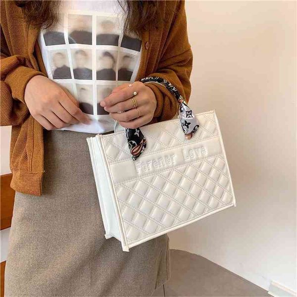 

fashion bag large capacity hand autumn and winter commuting fashion simple bag