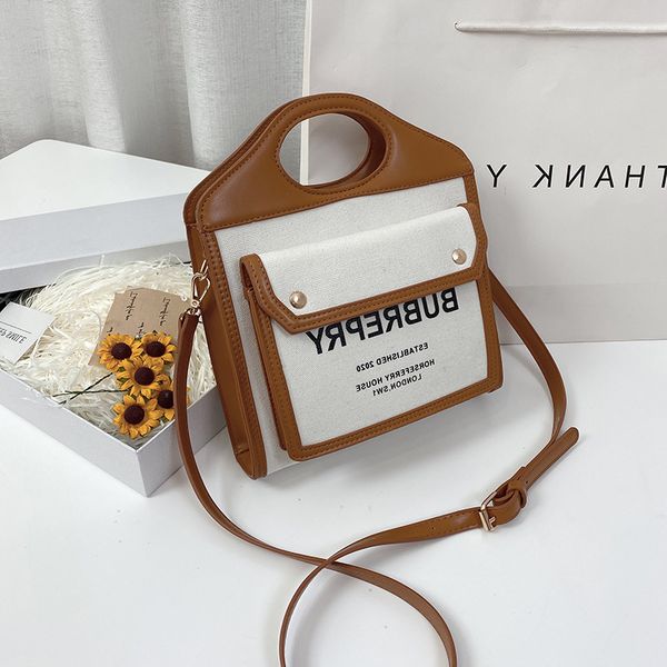 

designer bags 2022 new fashion satchel trend hand-held women's bag in canvas splicing contrast single shoulder personalized