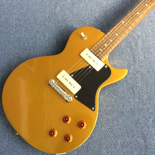 

electric guitar, solid mahogany, p90 pickup, gold.