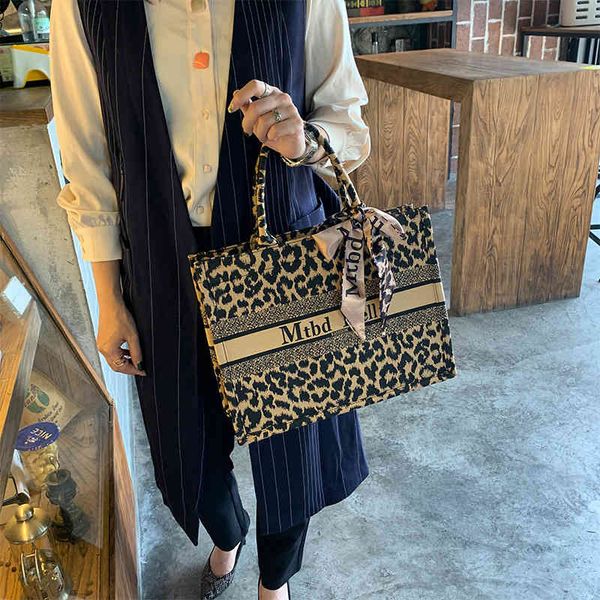 

new fashion trend luxury brand designer bag wholesale kong leather tote women's large capacity button leisure portable