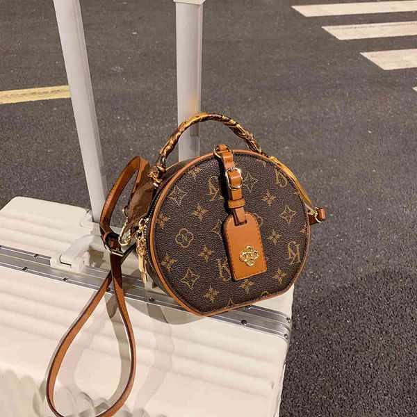 

super small round women's versatile net red 2022 new fashion messenger texture popular broadband shoulder bag