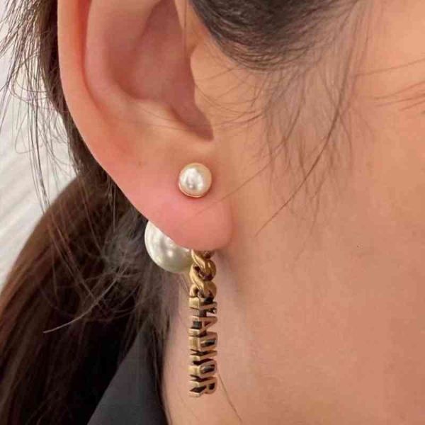 

earrings muya d family dijia ja letter female personality metal hollow out pearl tassel, Golden