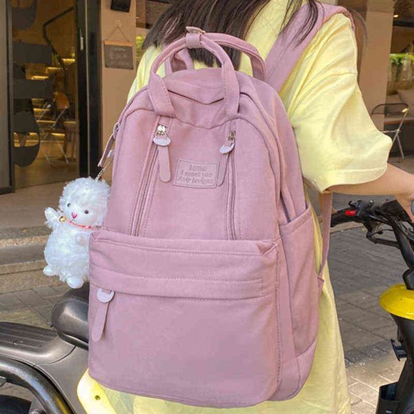 

est solid color satchel girls school student casual backpack multi-functional rucksack nylon female kawaii pendant mochila bags aa220316