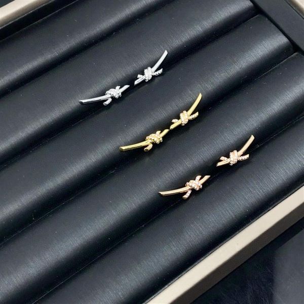 

europe america fashion lady women brass engraved t letter setting diamond 18k gold plated x-shaped knot stud earrings358x, Golden;silver