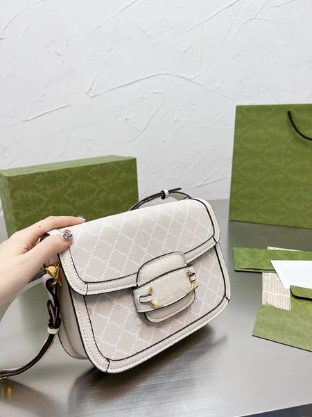 

designer designed diagonal bag. 25cm. lettered printing.