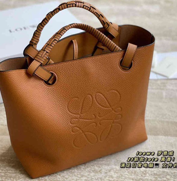 

designer handbag women loewss's bags shopping is whole of cow lether which hs super tctile nd hnd woven hndle