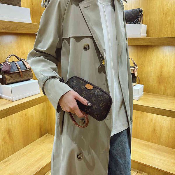 

kuya ky women's bag old money hand 2022 spring and summer yuanbao