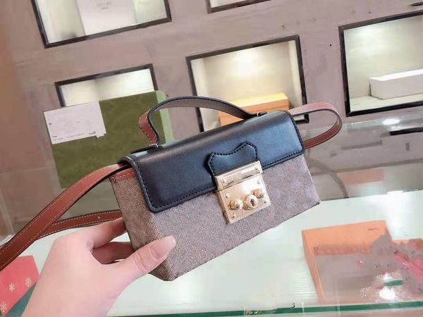 

classic real leather bag with handle and shoulder strap can be carried by hand