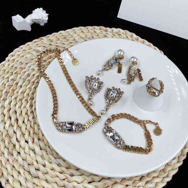 

new suit red wind diamond inlaid women's temperament han fan pearl earrings high version brass, Black