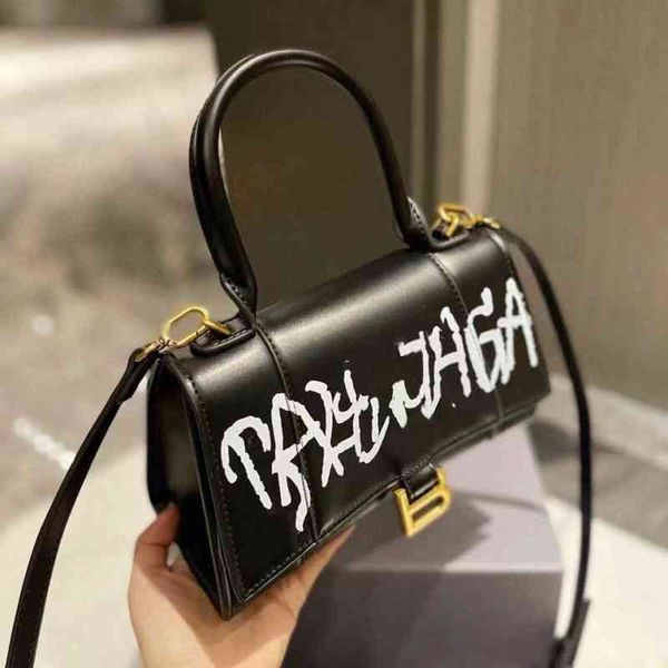 

7qjx premium 2022 new home b letter buckle graffiti hourglass bag leather women's portable one shoulder messenger