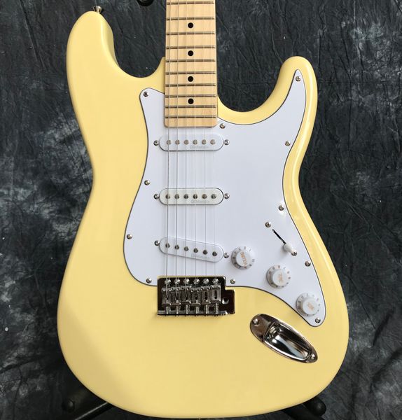 

yellow st electric guitar body mahogany neck maple with white pick guard