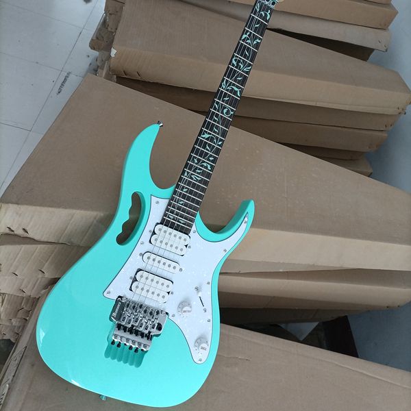 

6 strings blue electric guitar with tremolo bar rosewood fretboard