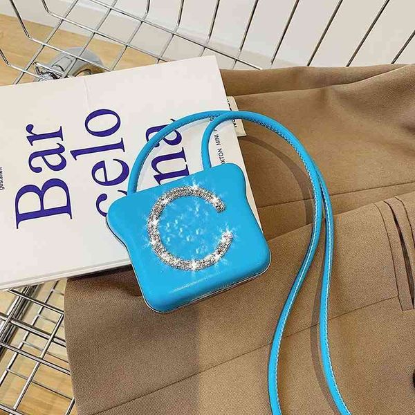 

mini headset bag cute biscuit smiling face messenger bag women fashion mouth mini earphone bags with baseball hat 220611