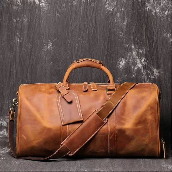

the first layer of cowhide men hand-held travel bag large capacity one-shoulder luggage women family paly practical
