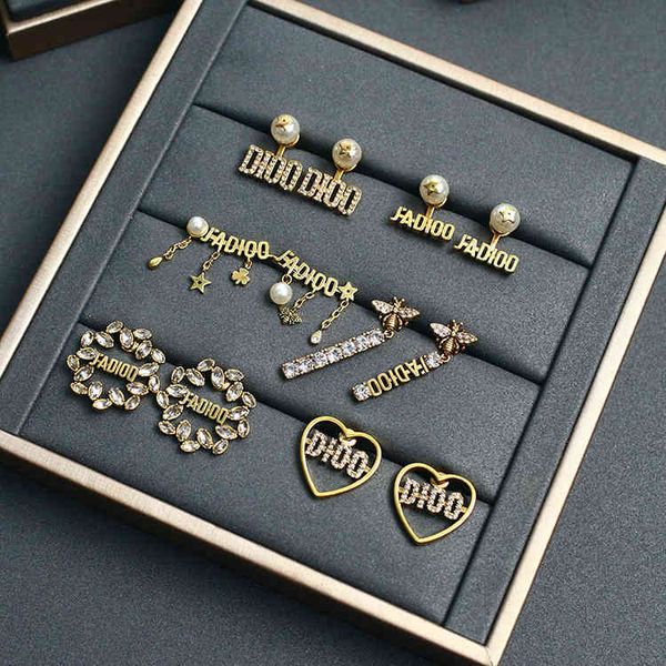 

factory super discount 70% off new letter pearl earrings in 2022, Golden