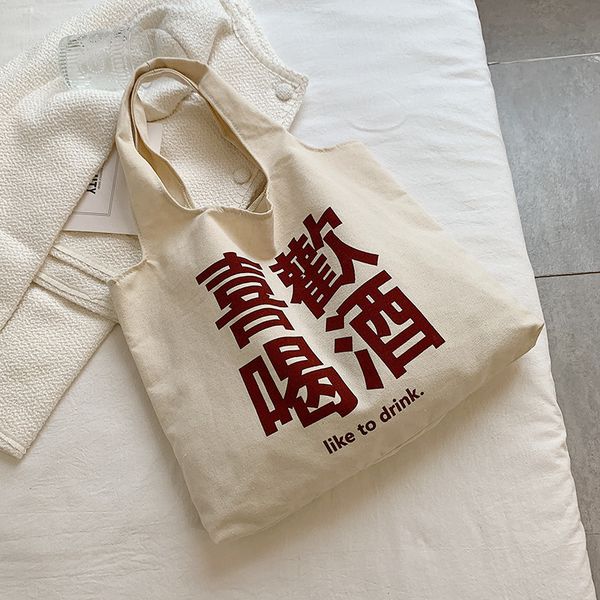 

2022 new canvas cartoon shoulder bag high capacity fashion bag
