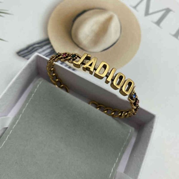 

2022 factory wholesale new small red diamond bracelet with female character, Golden