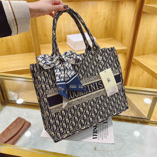 

2022 new designer handbags flower weaving capacity tote spring versatile one messenger hand