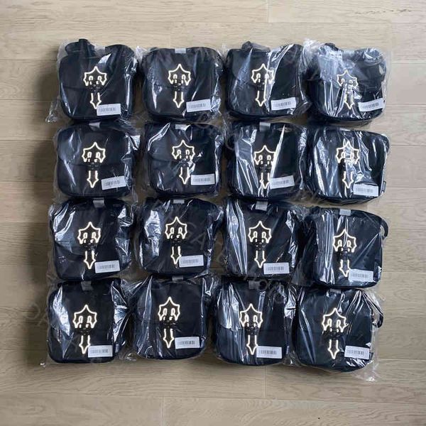 

trapstar reflective bag designer design trendy bag fashion one-shoulder men and women couples cross letters trend messenger refl ective