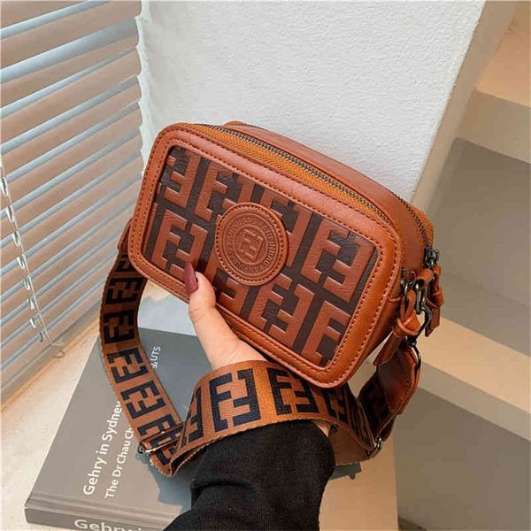 

ins super fire female versatile messenger korean retro wide belt printed single shoulder camera bag 75% purses stores sale