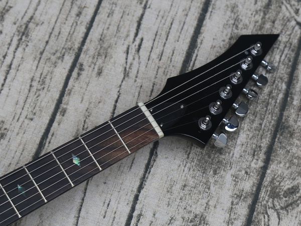 

x shape black electric guitar