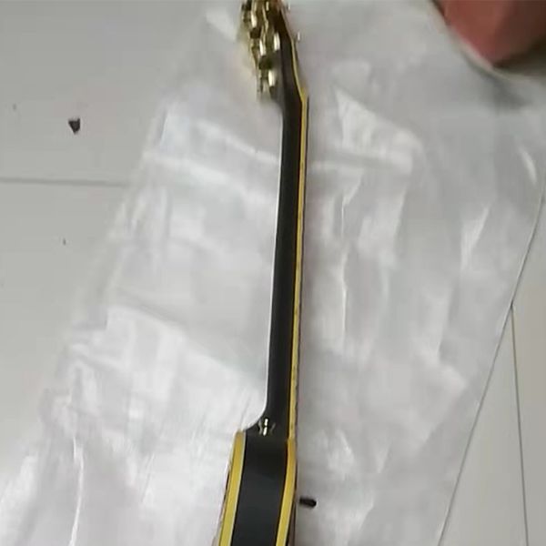 

customized matt black finish electric guitar with ebony fretboard and fret binding