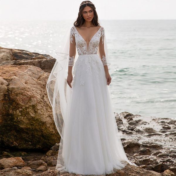

a-line wedding dresses long sleeves v neck hollow lace appliqued sequins sweep floor length hollow backless tulle lace plus size boho weddin, White