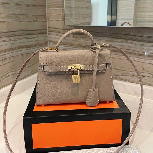 

fashion lady one side orange shoulder bags brand genuine leather small spring pu handbags lock message business ol over beige cross body