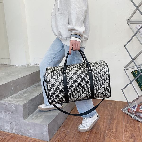

factory promotion new korean women's hand-held diagonal luggage short distance bag, large capacity travel bag