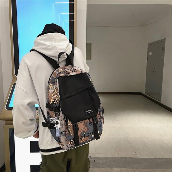 Sacos de escola 2022 moda coreana casual esportes mochila tendência personalidade graffiti ferramental de vento contraste cor saco de estudante