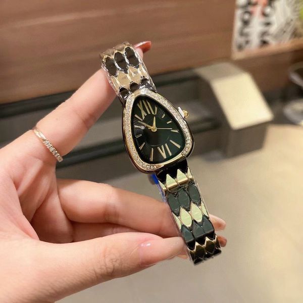 

30mm size of the ladies watch adopts the double surround type snake shape imported quartz movement diamond bezel, Slivery;golden