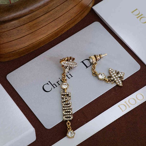 

2022 factory wholesale new asymmetric earrings female dijia brass wind inlaid diamond earrings, Golden